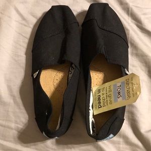 Toms , black. Size M12